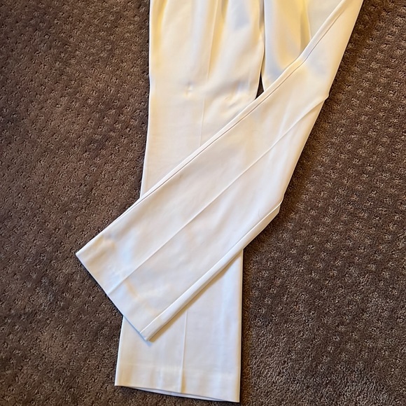 Cream stretchy dress pants by White House Black Market 6Boot cut. - Picture 5 of 6